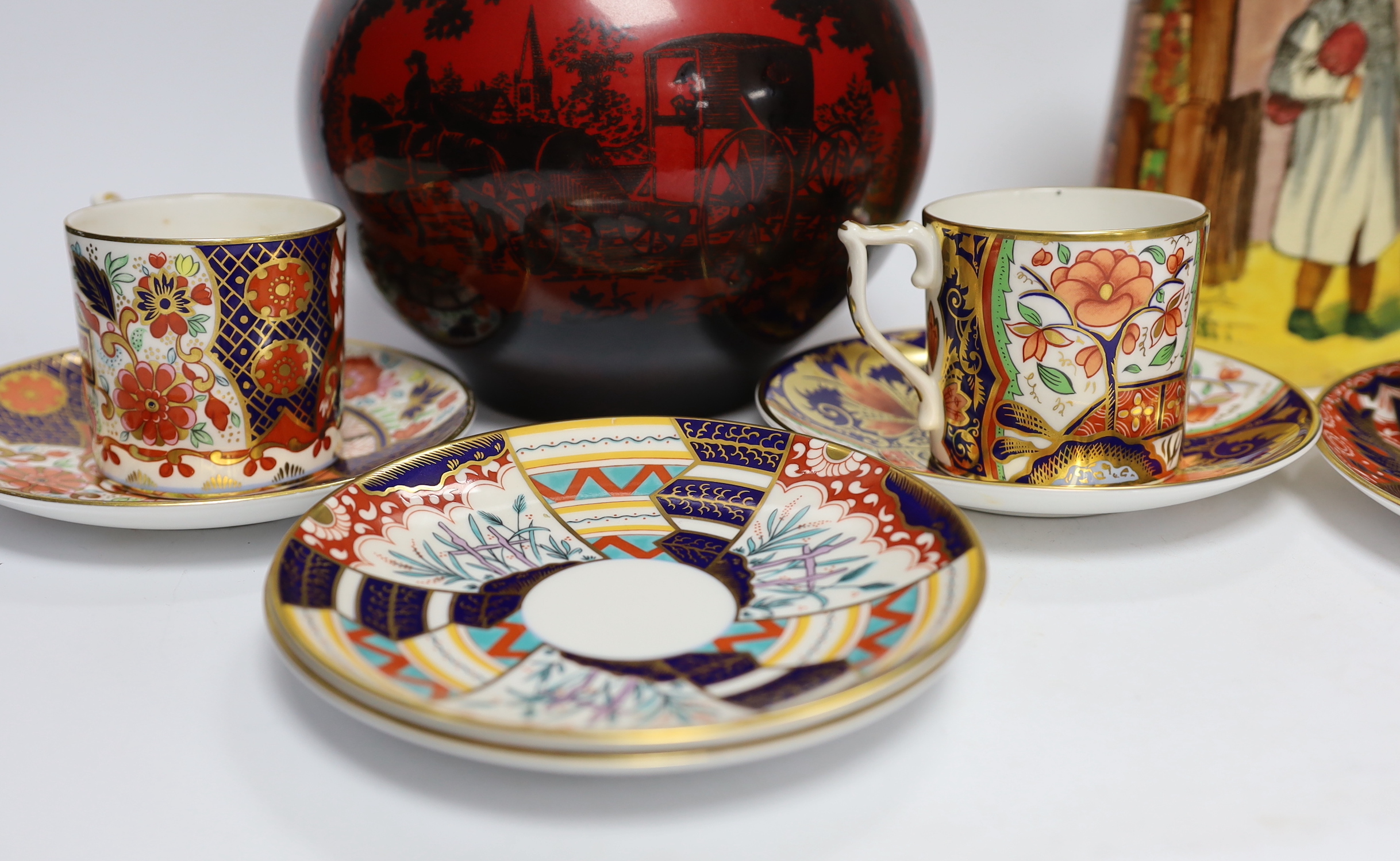 A Doulton flambé vase, a Gaffers Seriesware jug and Royal Crown Derby Imari cups and saucers, tallest 25.5cm